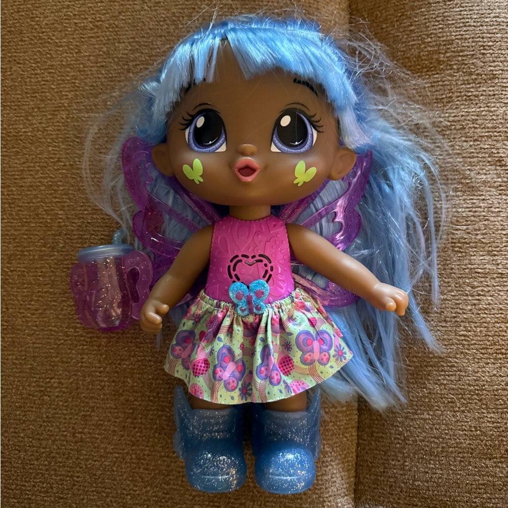 Whimsical Fairy Doll with Blue Hair and Purple Wings